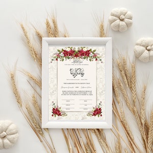 May include: A white framed Islamic marriage certificate with red floral accents. The text reads "This Agreement is to Certify That... were united in the auspicious bond of Islamic Marriage on September 17, 2019 in the city of Toronto at Masjid Al-Aqsa."