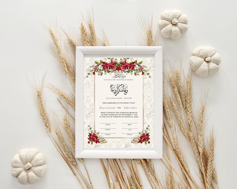 May include: A white framed Islamic marriage certificate with red floral accents. The text reads "This Agreement is to Certify That... were united in the auspicious bond of Islamic Marriage on September 17, 2019 in the city of Toronto at Masjid Al-Aqsa."