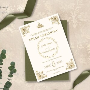 May include: Gold and white wedding invitation with ornate floral designs. The invitation announces a Nikah ceremony for Ayesha Ahmed and Daniyal Qureshi on Saturday, October 22, 2014 at 4 PM at Elizabeth Avenue Asbury Park, NJ.