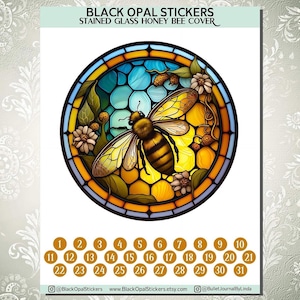 May include: A set of 31 round stickers featuring a stained glass design of a honey bee in a honeycomb with flowers. The stickers are numbered 1 through 31.