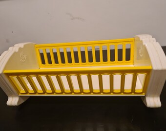 Fisher price doll cradle sale