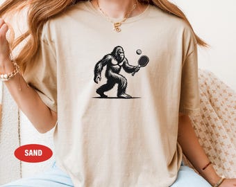 Sasquatch Pickleball - Unisex Softstyle T-Shirt - Funny Sasquatch t-shirt, Bigfoot pickle ball, gift for pickleball, funny pickleball shirt