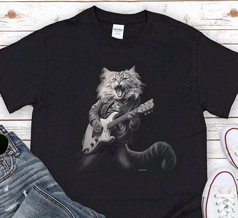 badass kitty cat playing the electric guitar, cool cat, guitar player, funny cat t-shirt, high-quality t-shirt