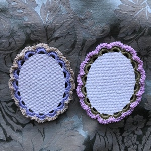 Small crocheted oval embellishment with blank center