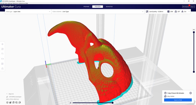 May include: A 3D model of a skull-like object is shown in a 3D printing software program. The model is red and yellow and is positioned on a blue and white grid. The software interface is visible in the background.