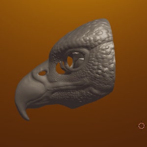 May include: A gray, detailed, 3D printed bird mask with a beak and eye holes. The mask is designed to be worn over the face.