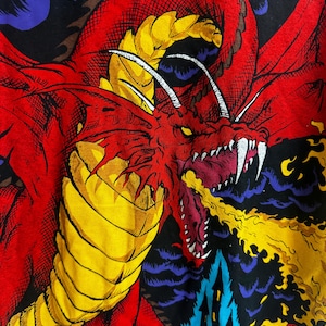 May include: A red dragon with yellow scales and white horns breathes fire against a black background with purple and blue clouds.