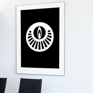 May include: A black and white framed print with a stylized geometric design of a circle with a flame inside. The circle is surrounded by concentric rings.