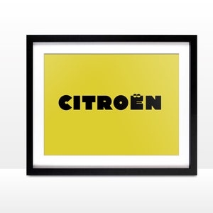 May include: A black framed print with a yellow background and the word "CITROEN" in black bold letters.