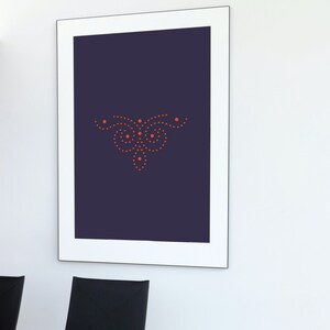 May include: A framed print with a dark blue background and a stylized design of orange dots in the center.