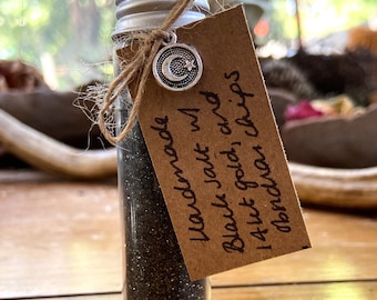 Sacred black salt w. 14kt gold powder + obsidian chips for ritual and magical practice. Witchcraft and pagan spells. Protection, warding.