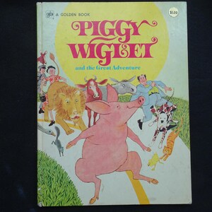 May include: A Golden Book titled "Piggy Wiglet and the Great Adventure." The cover features a large pink pig, a lion, a cow, a donkey, and other characters. The title is in pink letters on a yellow background.