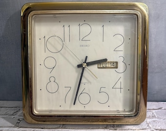 Vintage Seiko Quartz Wall Clock, 1980s. Gold Tone Frame, Day/Date Display, Works