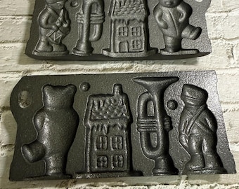 2 Vintage John Wright Cast Iron Christmas Molds, Drummer, Bear, Horn, House