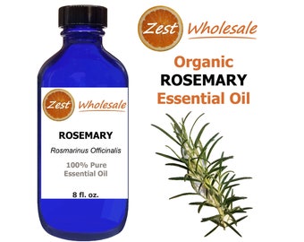 May include: A blue glass bottle with a white label that reads "Zest Wholesale Organic Rosemary Essential Oil". The label also includes the botanical name "Rosmarinus Officinalis" and states that the oil is 100% pure. The bottle contains 8 fluid ounces of oil. A sprig of rosemary is shown to the right of the bottle.
