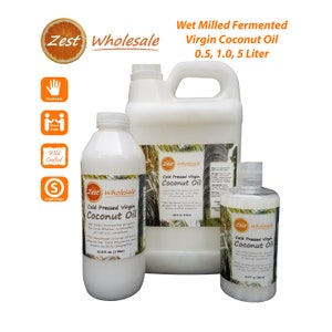 May include: Three white bottles of Zest Wholesale Cold Pressed Virgin Coconut Oil. The bottles are labeled with text and a logo. The sizes are 0.5, 1.0, and 5 liters. The image also includes icons for handmade, direct trade, wild crafted, and single origin.
