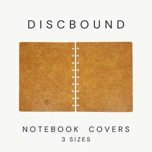 May include: A pair of tan, textured discbound notebook covers featuring a small circular logo on the left side. The text DISCBOUND appears at the top, and NOTEBOOK COVERS 3 SIZES is printed at the bottom. The covers have pre-punched holes.