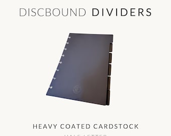 May include: A dark gray discbound divider made of heavy coated cardstock in half letter size. The divider features a series of circular cutouts along the left edge for disc binding and five tabs along the right edge. Text reads DISCBOUND DIVIDERS.