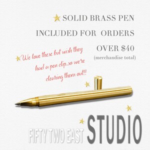 May include: A solid brass pen with a smooth, cylindrical body and a separate matching cap. The text on the image reads: SOLID BRASS PEN INCLUDED FOR ORDERS OVER $40 (merchandise total) We love these but wish they had a pen clip...so we're clearing them out!! FIFTY TWO EAST STUDIO.