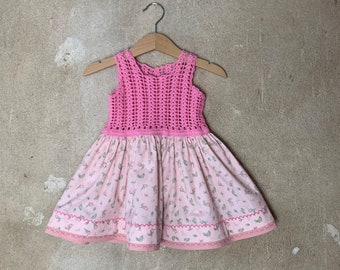 Pink crochet dress with a floral skirt