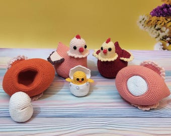 May include: A set of crocheted chicks and eggs in various colors, including pink, orange, red, white, and yellow. The chicks have small black eyes and beaks. The eggs are crocheted in a realistic style.