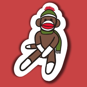 Chaussette de Noël singe dans une écharpe peluche jouet Noël vacances tradition annuel saisonnier cadeau bas de page autocollant et/ou marque-page