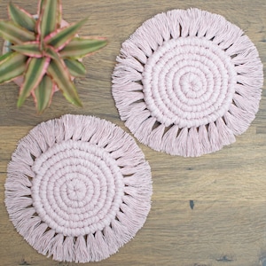 Blush pink macrame coaster sets for boho home office desk, campervan coffee station or guest bedroom bedside table. Cute balcony accessories