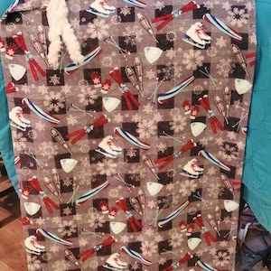Flannel gift bag with ice skates print