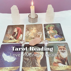 May include: A tarot reading setup featuring cards with illustrations and text, including "Oracle," "Earth Mother," and "Spirit Fox." A lit candle, crystals, and the words "Tarot Reading, Love, Money, Health" are also present.