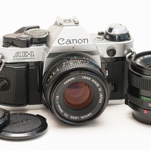 Canon AE-1 PROGRAM film camera with 2 lenses set 50 mm f/1.8 and 28 mm f/2.8