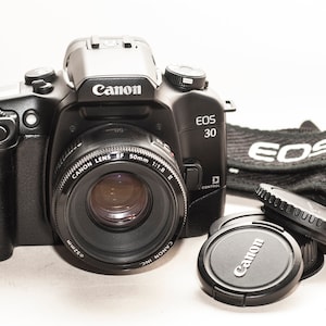Canon EOS 30 film camera with Canon 50 mm f/1.8 EF lens and original strap - EXCELLENT.