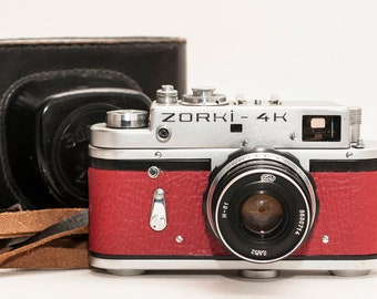 Russian rangefinder 35 mm flim camera zorki 4 with  50 mm f2 Feed lens and original camera case and two films.