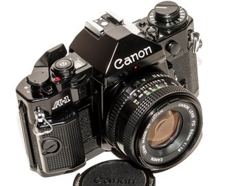 Canon A-1 film camera with lens 50 mm f/1.8 - EXCELLENT.