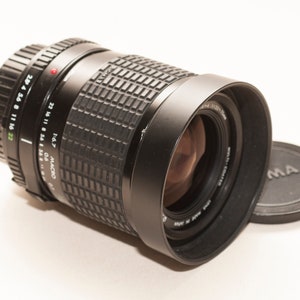Minolta MD fitting SIGMA lens 35-70 mm f/2.8-4 EXCELLENT.
