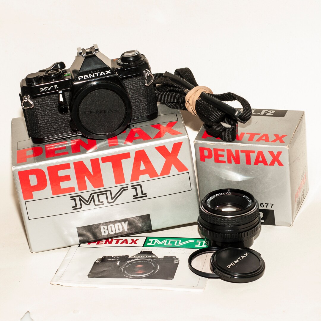 フィルムカメラ ASAHI PENTAX MV1 50mm 1:2 smc PENTAX-M Pentax MV1 SLR Film Camera SMC Pentax-M 1:2/50 Lens - Vintage Lens