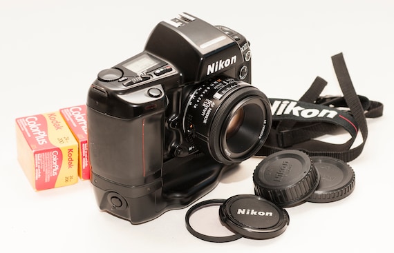 Nikon F90X Film Camera with 50mm Lens, Battery Pack & Expired Kodak Film