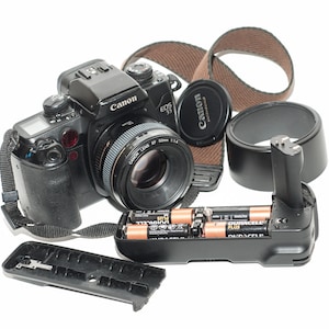 Canon EOS 55  with canon EF 50 mm F1.4 lens.