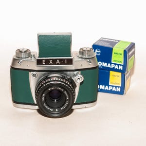 Exa 1a SLR prism finder; with Waist level finder Modular system and 50 mm f/2.8 DOMIPLAN lens, and two films 100/400 ISO b&w.