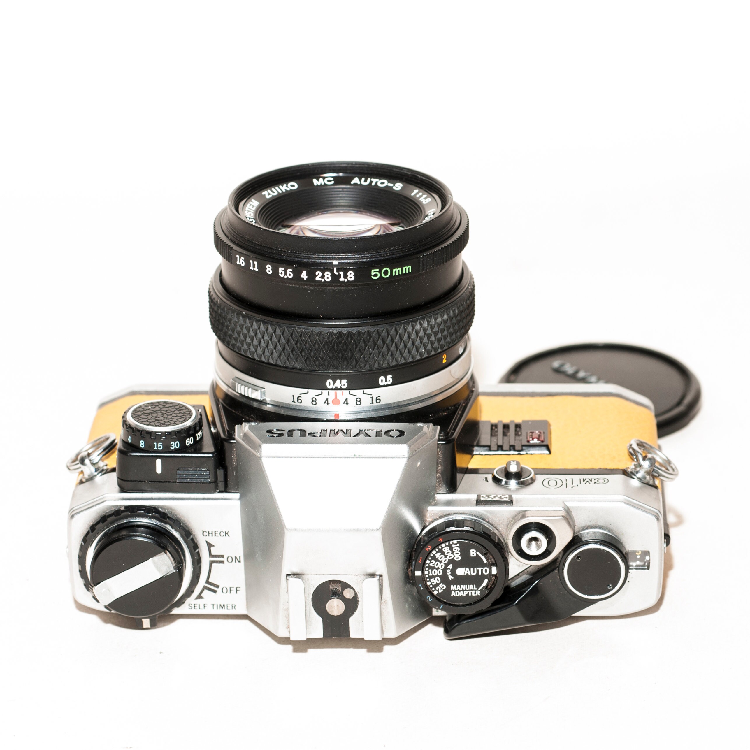オリンパス OM 10、ZUIKO 50 mm f/1.8 レンズ、マニュアルアダプター