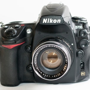 Nikon fitting AUTO RIKENON lens 55 mm f1.8