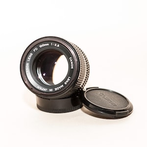 100 mm Canon FD lens f/2.8 - EXCELLENT.