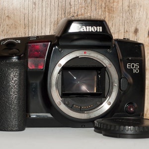 Canon EOS 10 film camera.