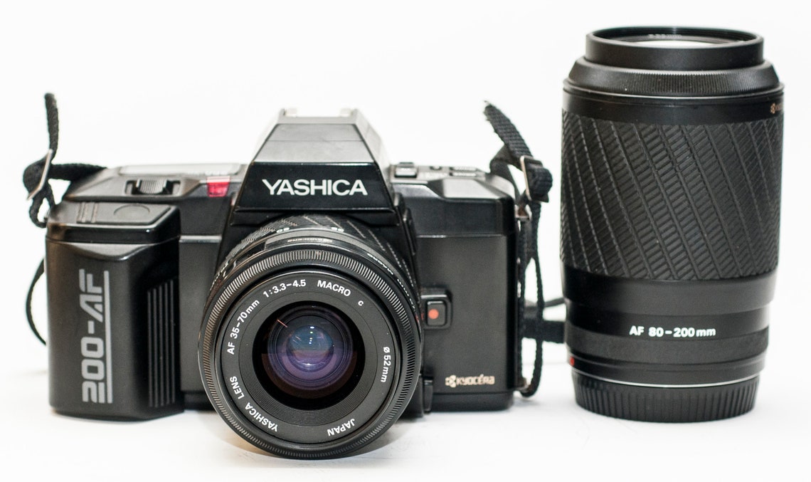YASHICA 200 AF film camera with 2 AF lenses 3570mm f3.34.6 Etsy
