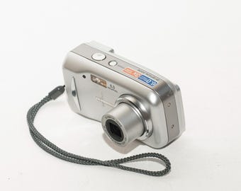 OLYMPUS FE-120 digital camera.