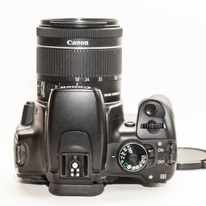 Digital camera. Canon EOS 400D with 18-55 mm f/4-5.6 IMAGE STABILISATION lens. image 5