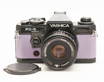 ヤシカ FX-D クォーツ 35 mm フィルムカメラ（50 mm f/2 レンズ付き