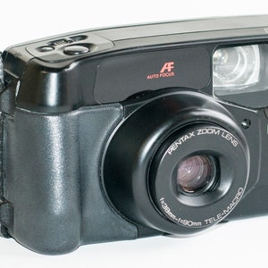 Pentax ZOOM 90 point and shoot 35 mm film camera.