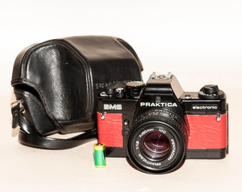 Vintage 35 mm film camera PRAKTICA BSM Electronic with 50 mm 1.8  lens.,