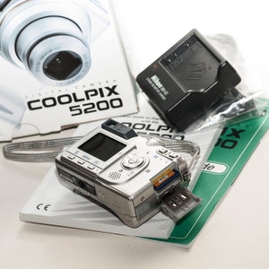 Nikon Coolpix 5200 new like BOXED. image 8