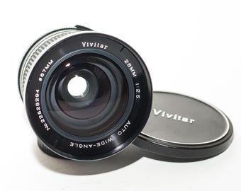 M 42 screw fitting VIVITAR 28 mm f/2.5 wide angle lens - NEAR MINT.